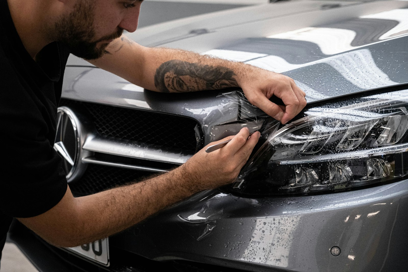 Paint protection being applied during detailing